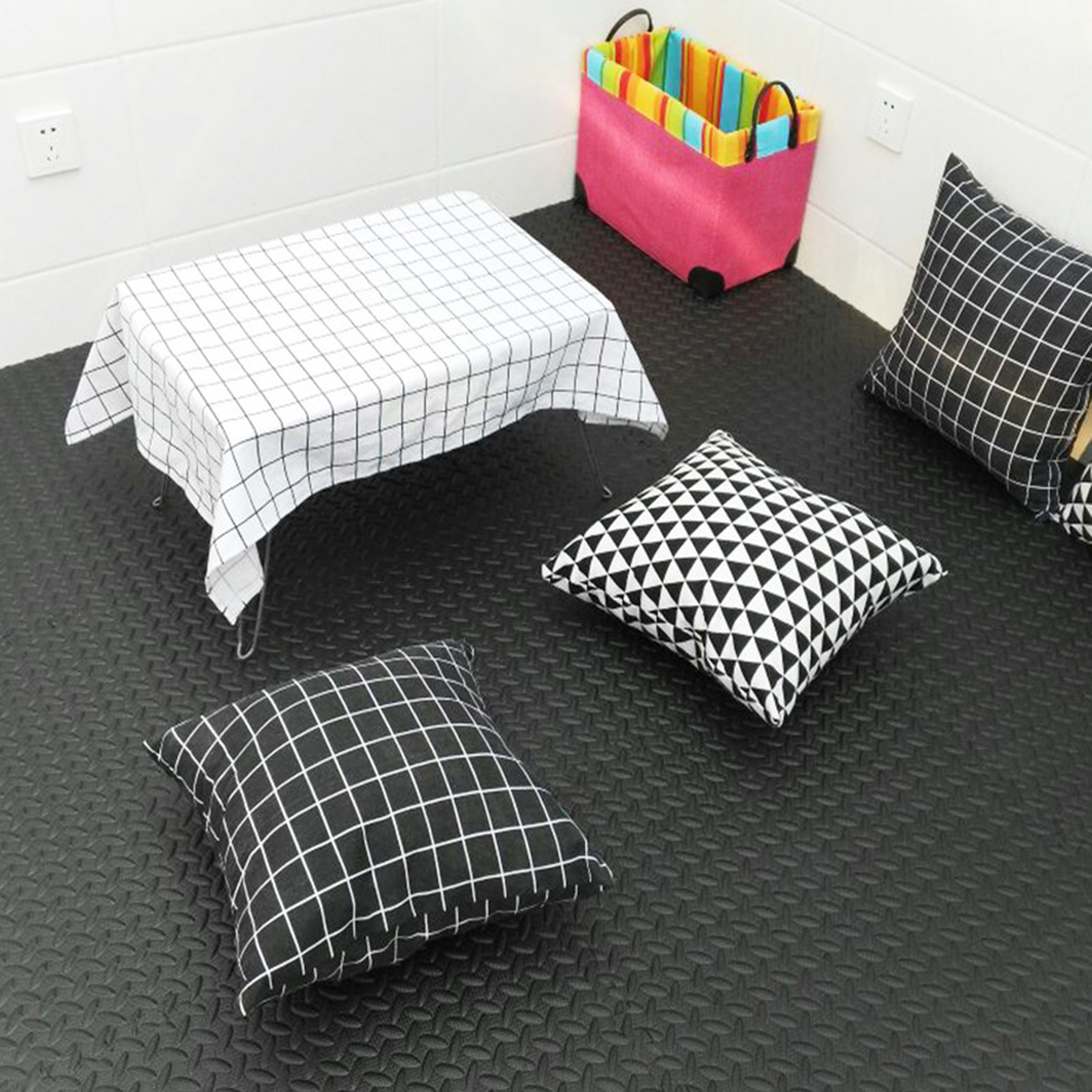 Living room with black foam mat