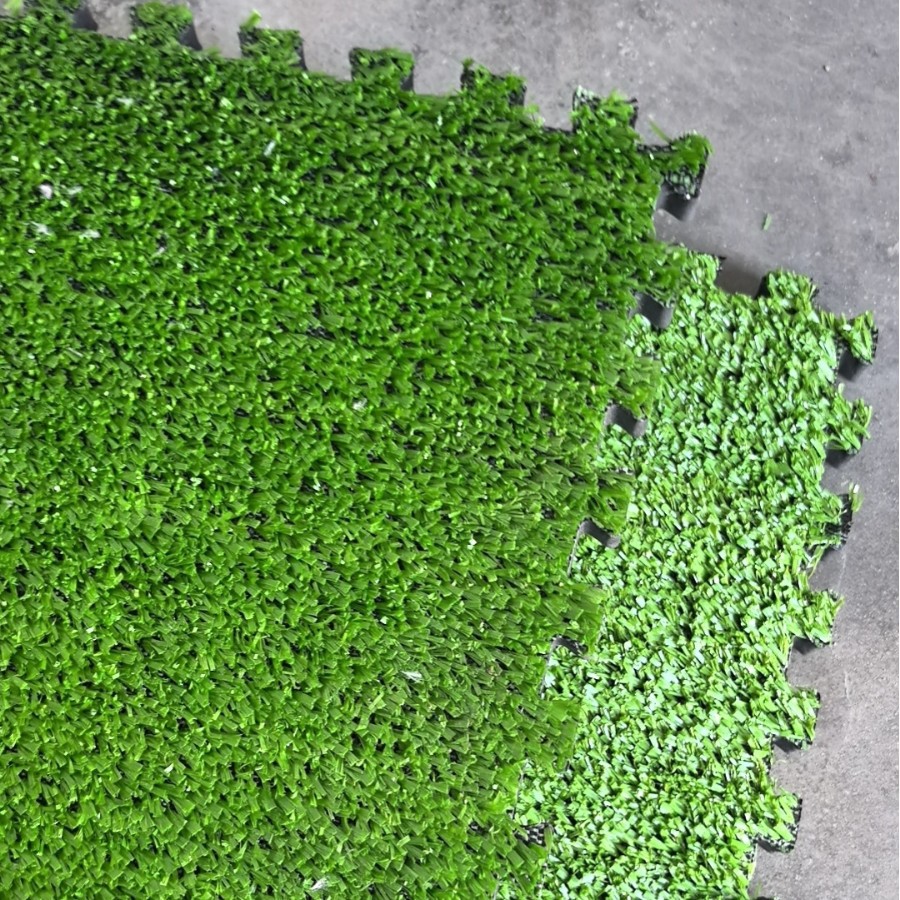 Grass tile with rubber backing close - up