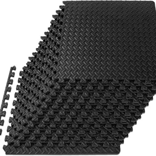 Stacked black foam tiles